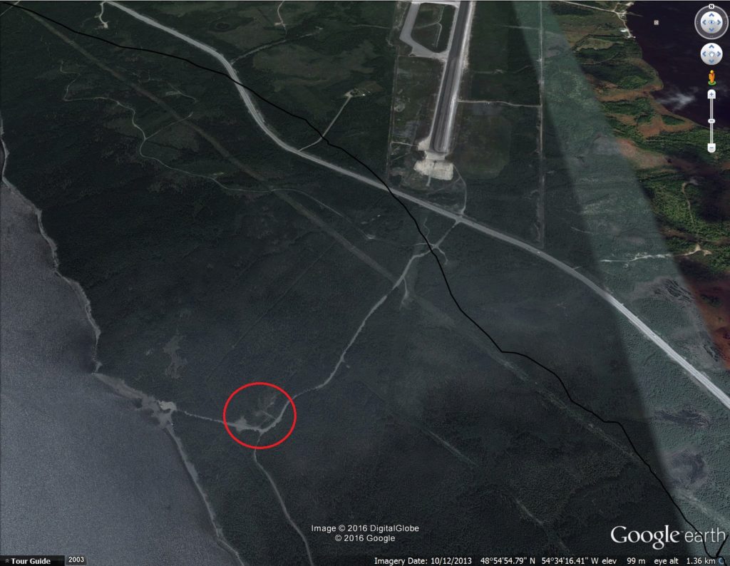 The location of the crash site (circled) in relation to the end of the runway and the Trans Canada Highway that passes through Gander. From GoogleEarth.
