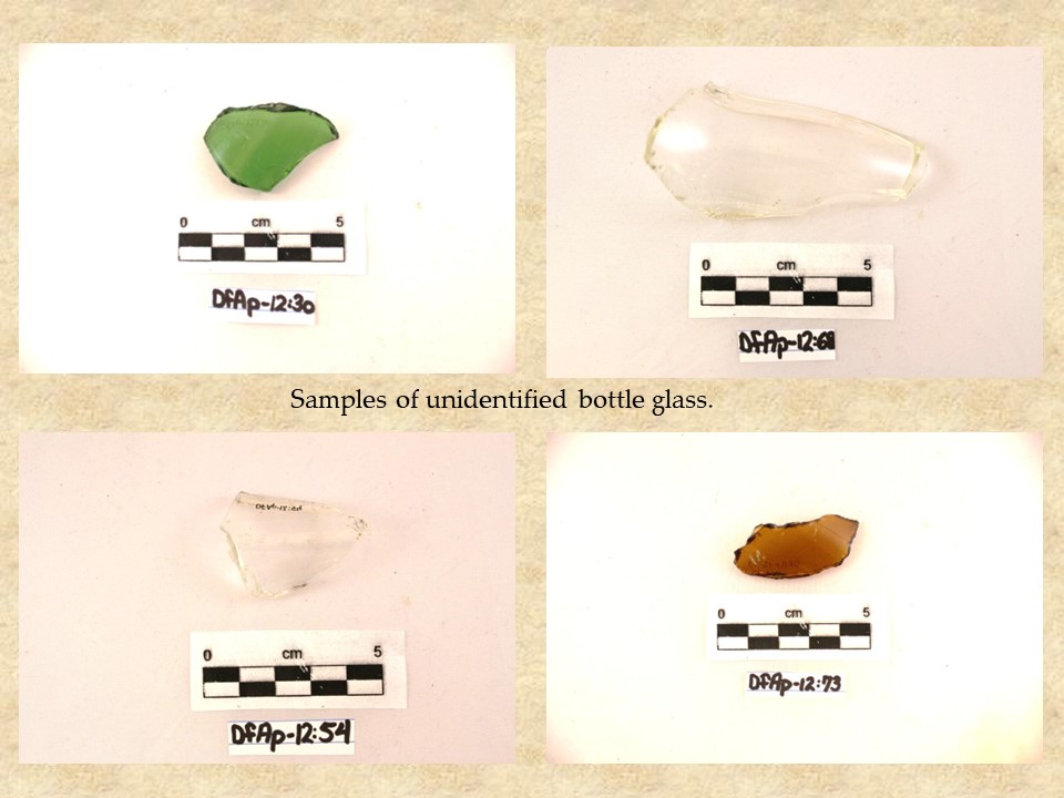 Unidentified bottle glass. Some is clear but unmarked, one is bright green, and one is brown.