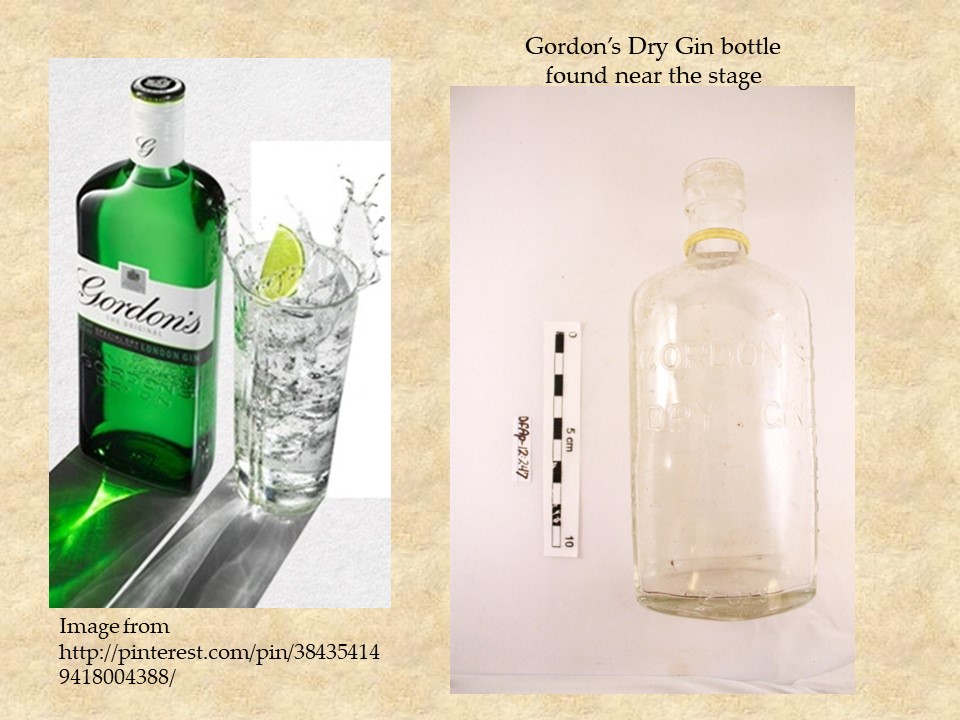 A complete Gordon's Dry Gin bottle found on site with an advertisement for comparison
